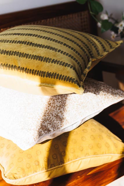 Stack of block print cushion covers for festive season