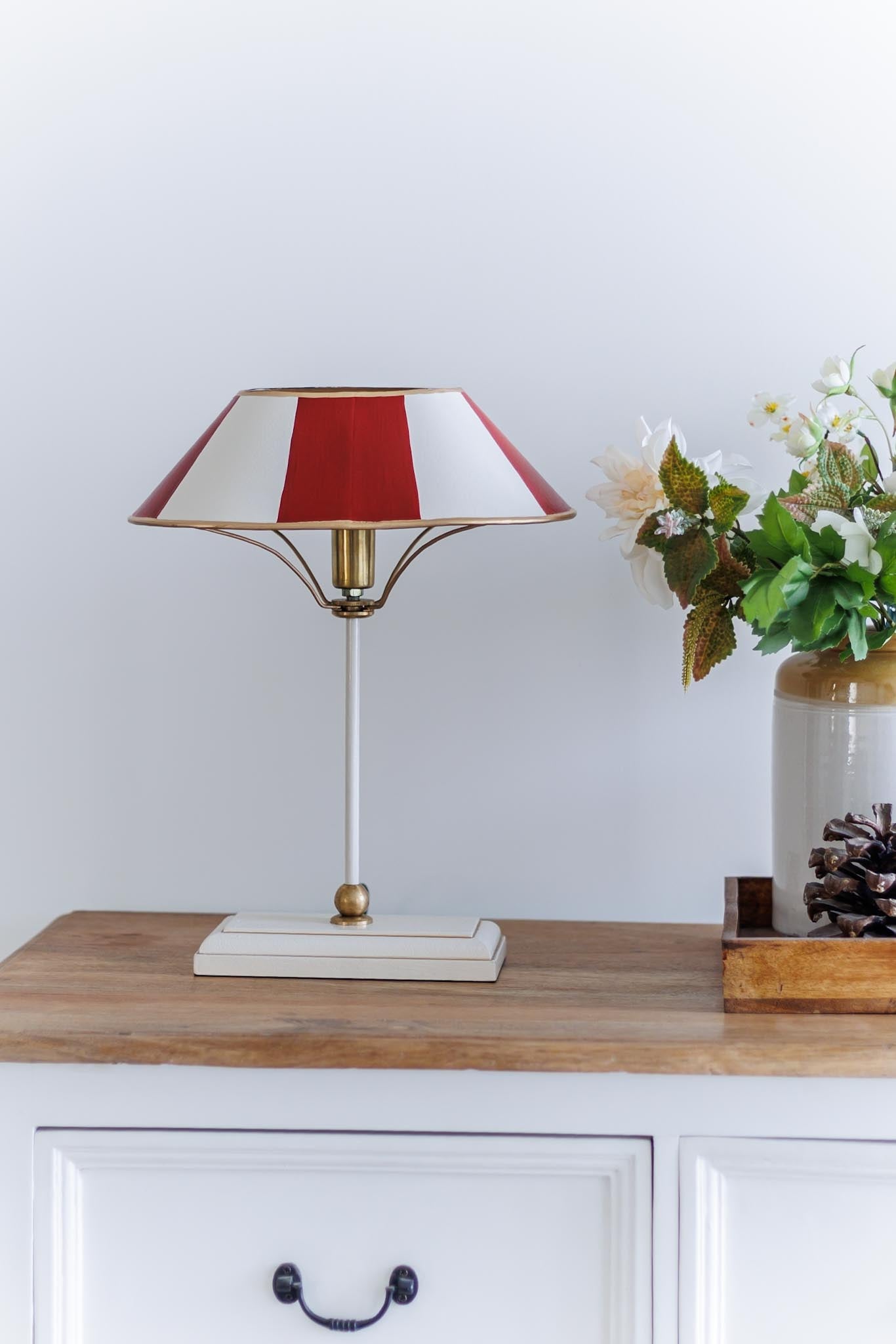 Paris-inspired striped table lamp styled on a console table
