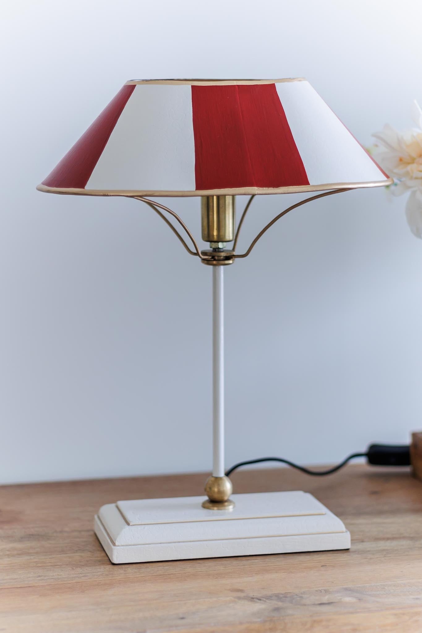 Paris-inspired striped table lamp styled on a console table
