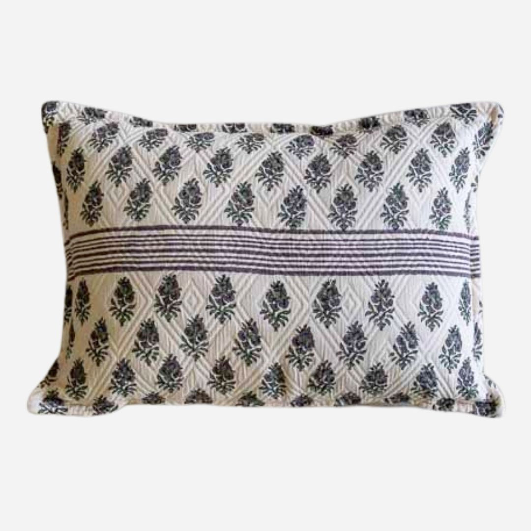 A lumbar cushion cover , featuring a block print  geometric pattern and a horizontal stripe motif in the center.