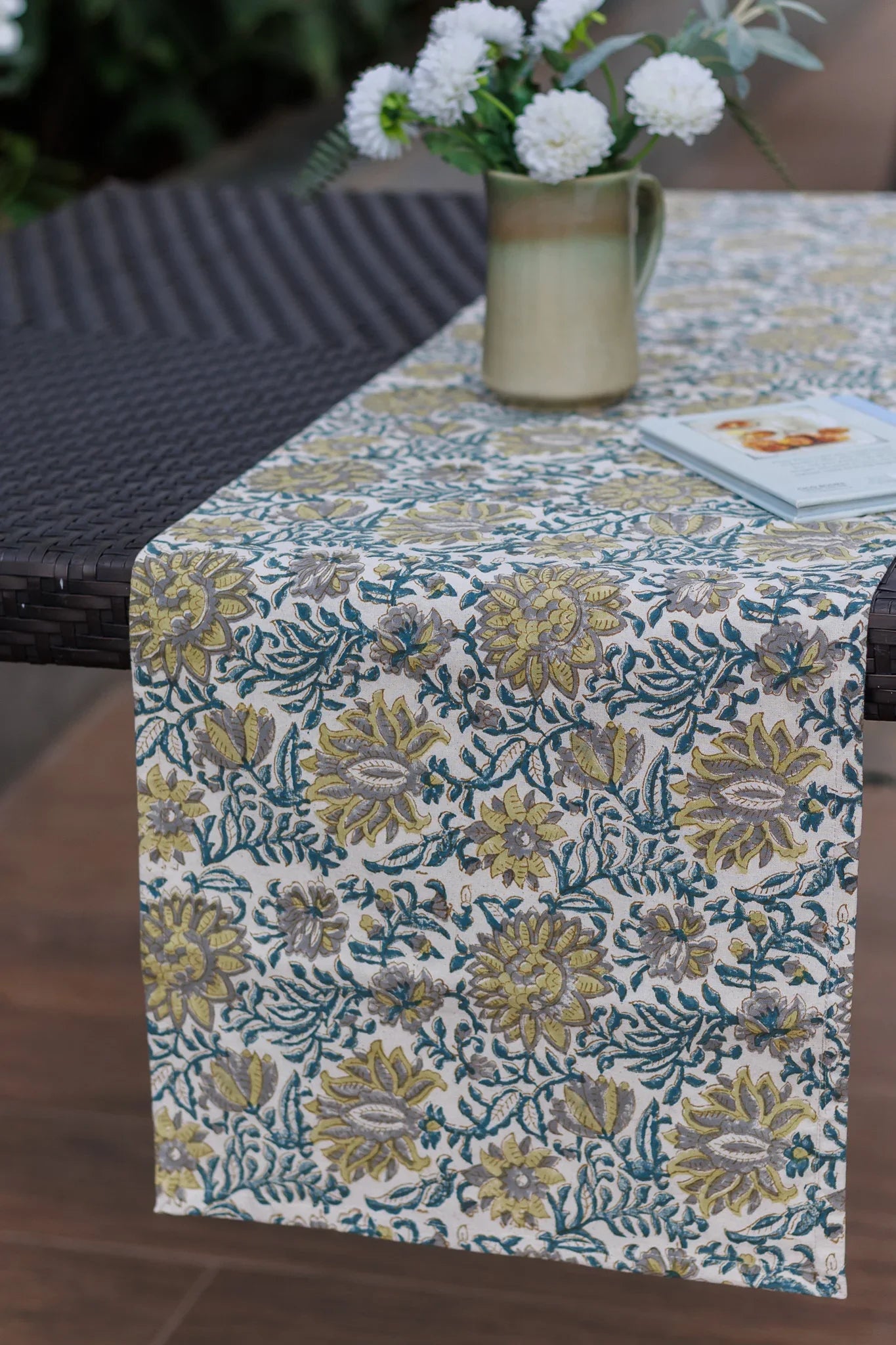 Block print Table Runner with Flowers in a Vase and a Book on table setting