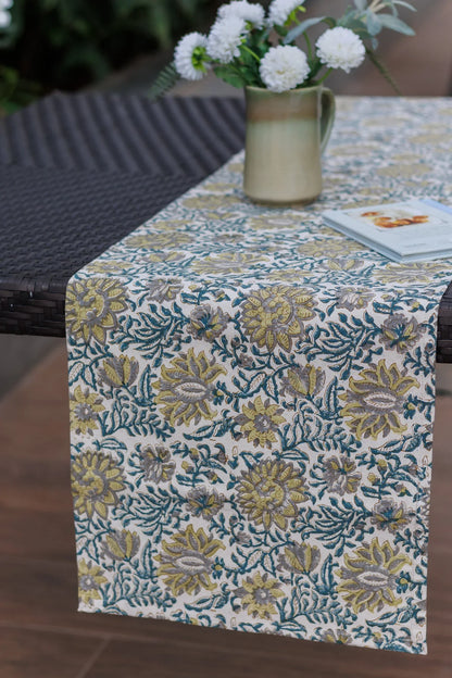 Block print Table Runner with Flowers in a Vase and a Book on table setting