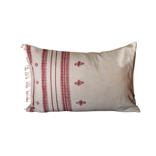 A kala cotton handloom cushion cover with red embroidered geometric patterns and fringe on the left side, shown against a plain white background