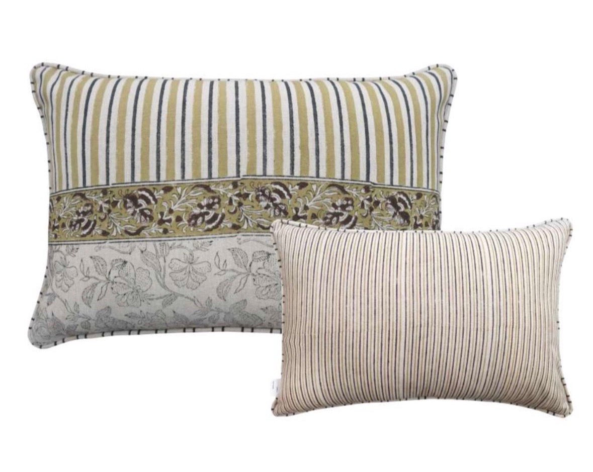 A decorative throw pillows on a white background showing reversible patterns features vertical stripes in olive green, beige, and dark brown, with a central floral patterned band and a light gray floral lower section.