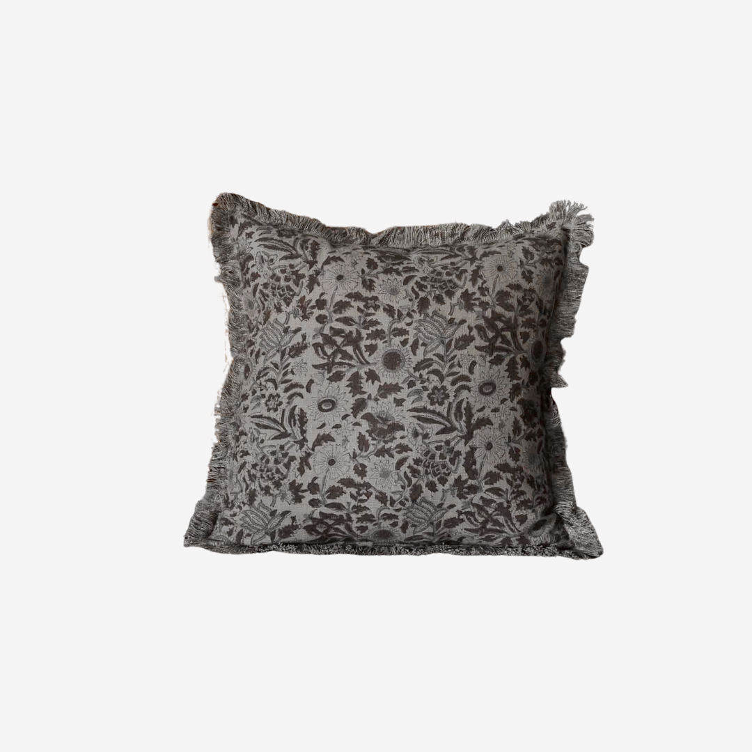 An Olive green block print cushion cover on. White background 