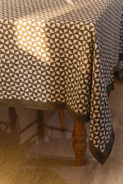 Tablecloth with geometric pattern on a wooden table